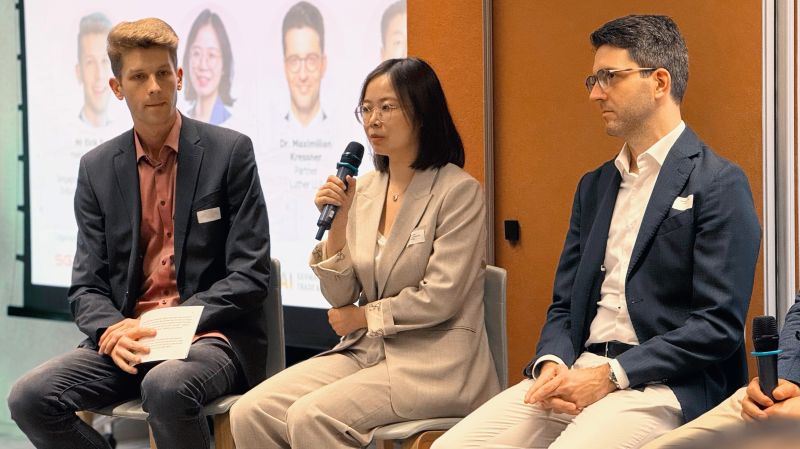 Speakers in discussion during the SGTech Germany market-entry seminar.