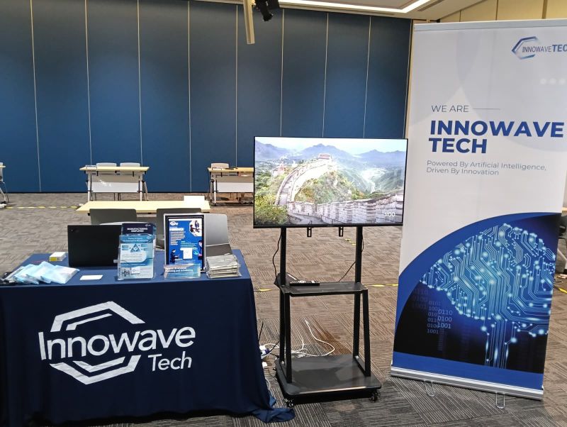 Innowave Tech industrial AI demonstration equipment and display at the workforce event.