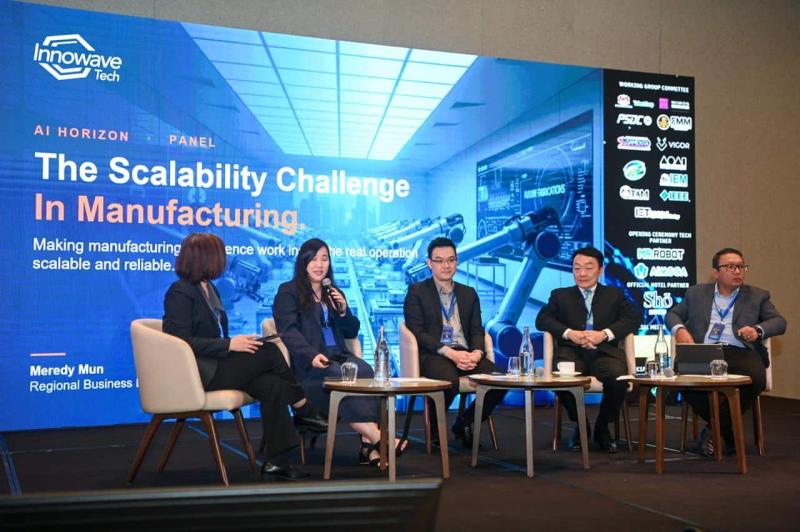 Five panellists on stage during the manufacturing AI discussion at AI Horizon 2026 in Penang.